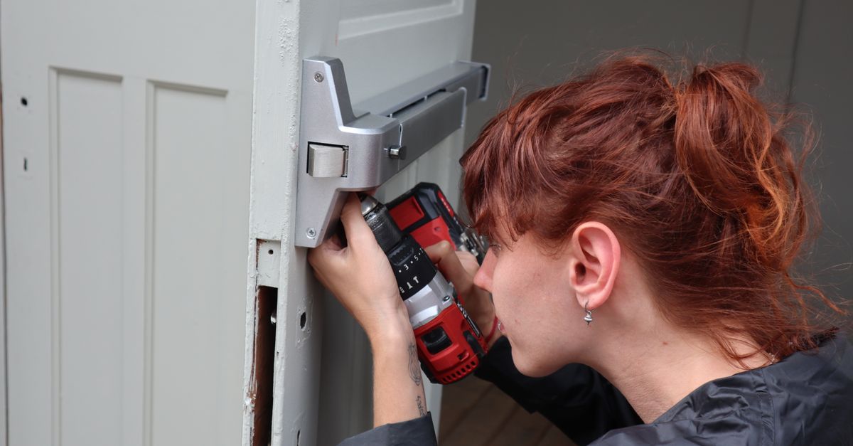 locksmith unlocking front door — Paterson Locksmiths